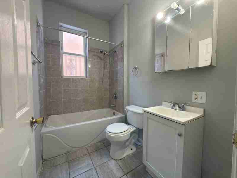 5116 S Prairie Ave #1 - Photo 4 of 13