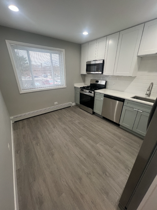 10457 Dearlove Rd #1B - Photo 3 of 17