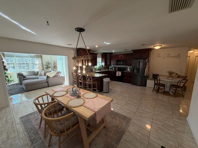 8110 Rose Marie Ave E - Photo 5 of 14