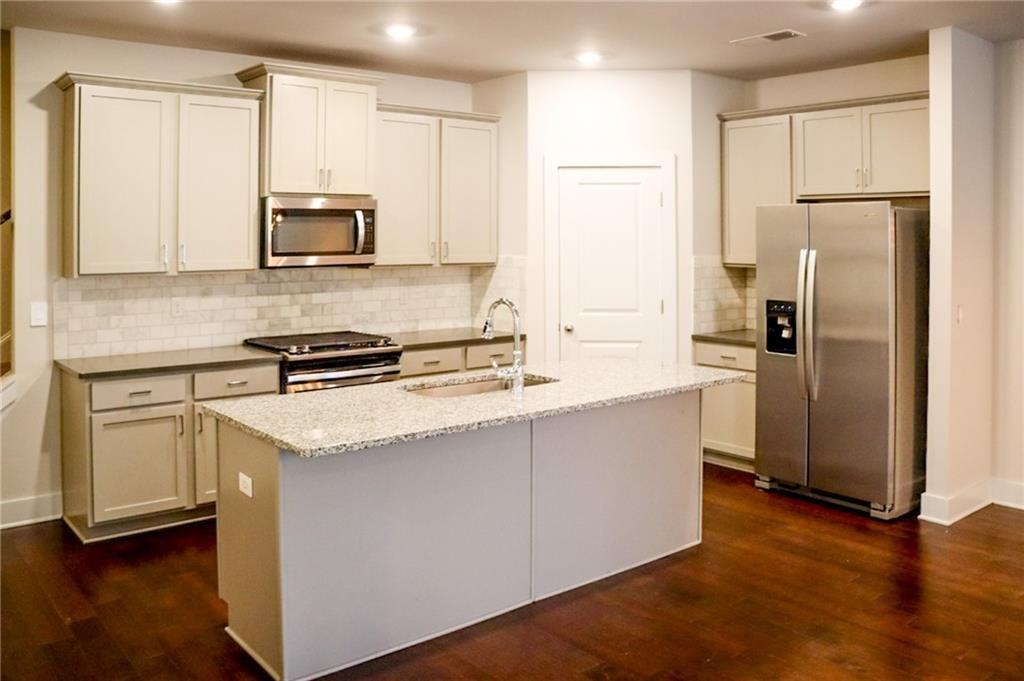 1317 Heights Park Dr Se - Photo 3 of 17
