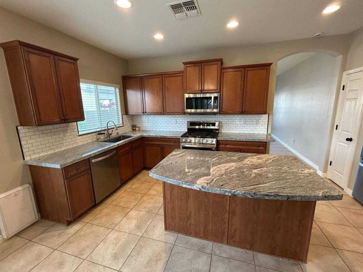 14527 W Gelding Dr - Photo 3 of 10