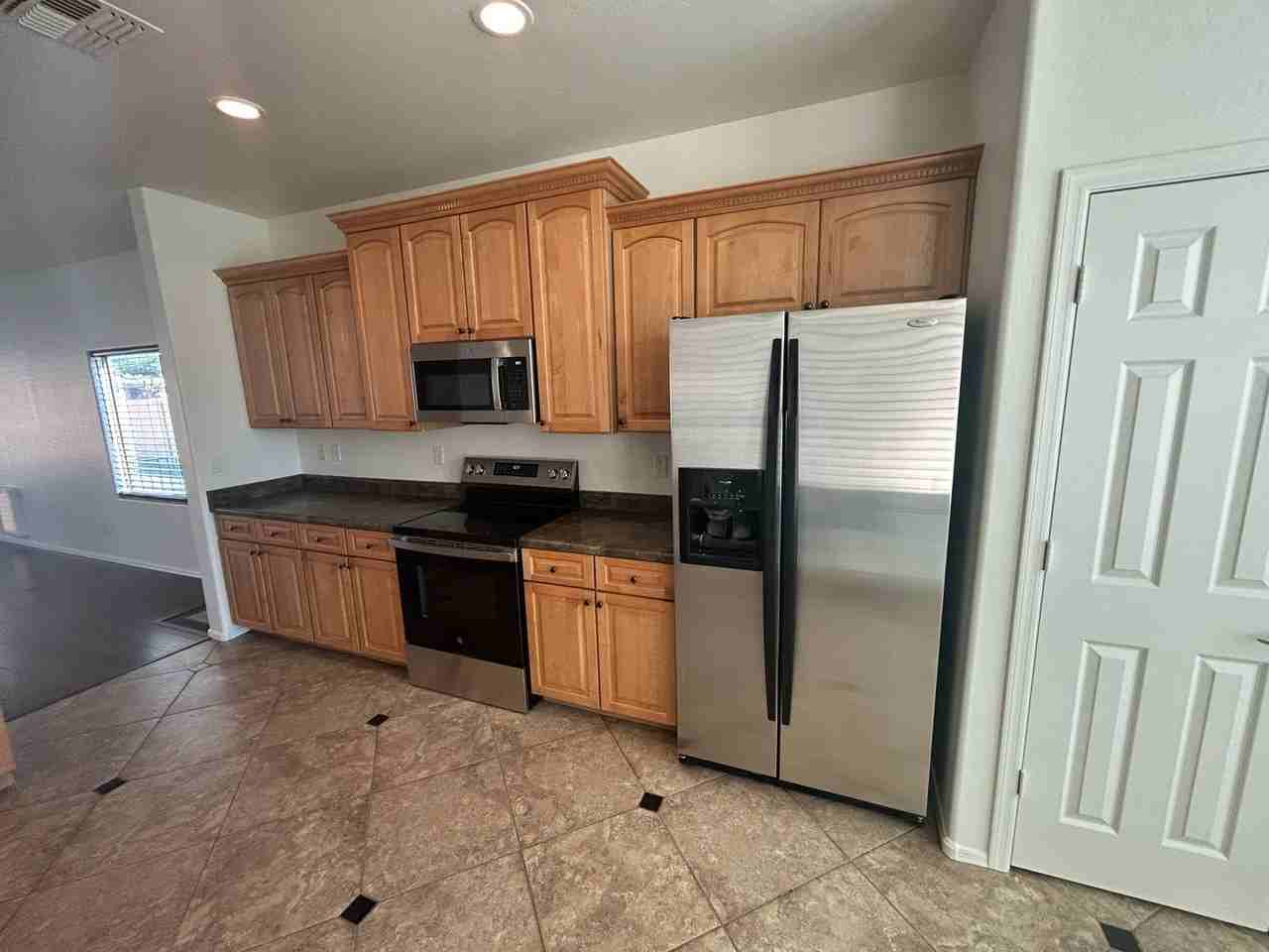 16024 W Gelding Dr - Photo 5 of 21