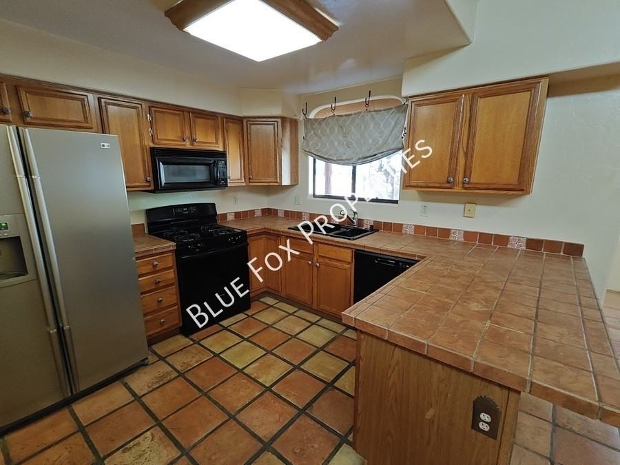 9097 N Jessy Ln - Photo 2 of 50