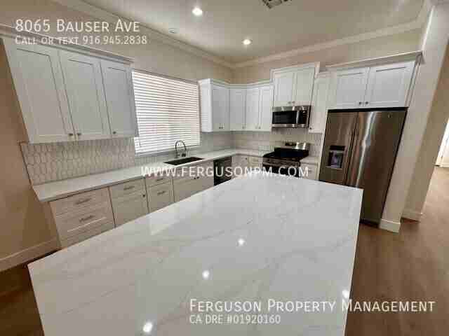 8065 Bauser Ave - Photo 3 of 30