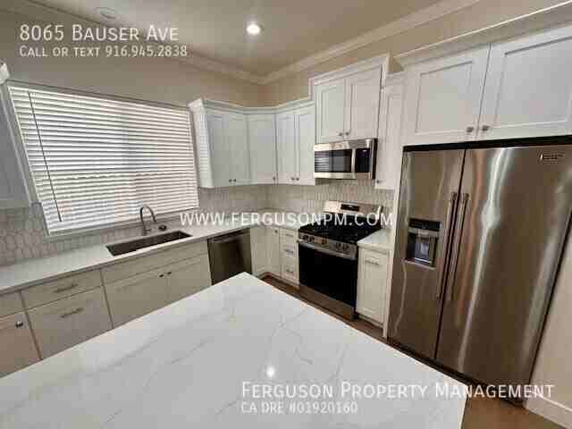 8065 Bauser Ave - Photo 4 of 30