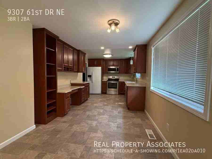 9307 61st Dr Ne - Photo 4 of 19