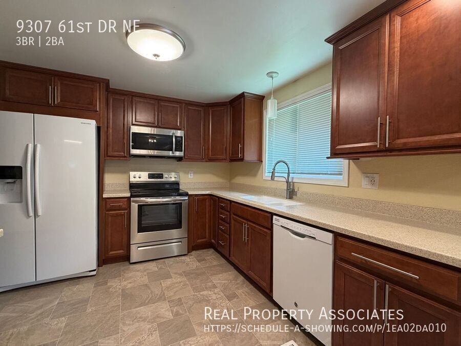 9307 61st Dr Ne - Photo 6 of 19