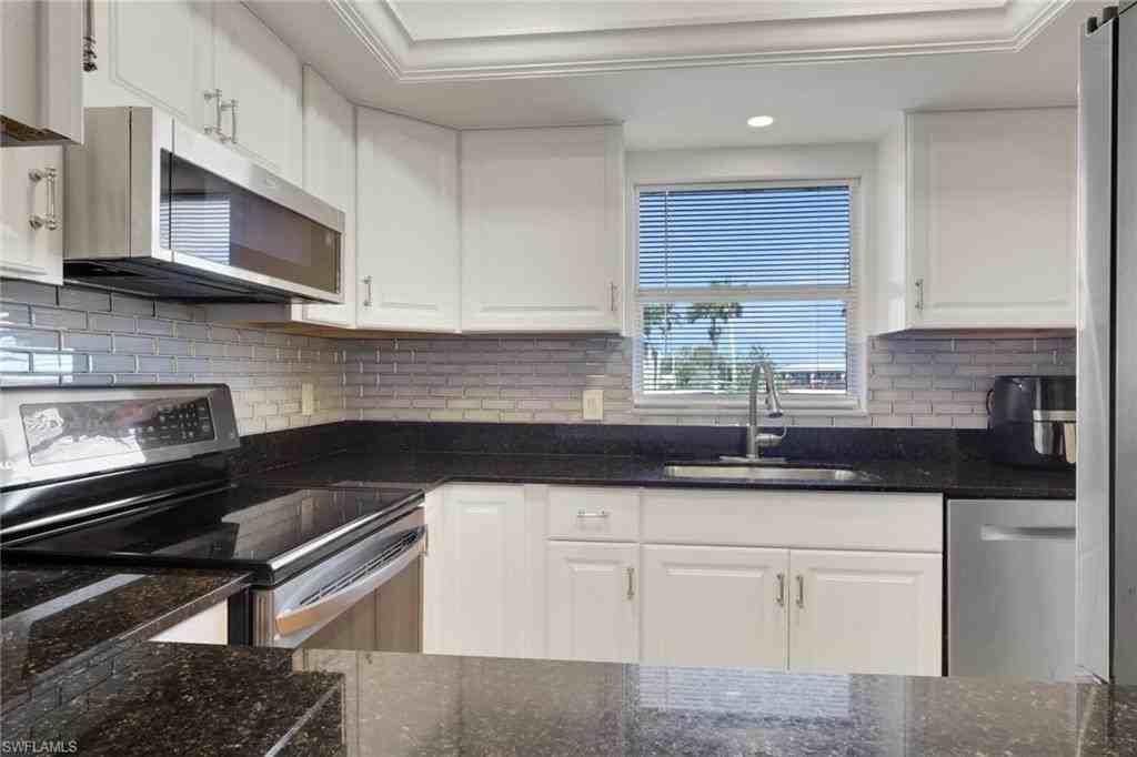 5499 Rattlesnake Hammock Rd #A207 - Photo 3 of 32