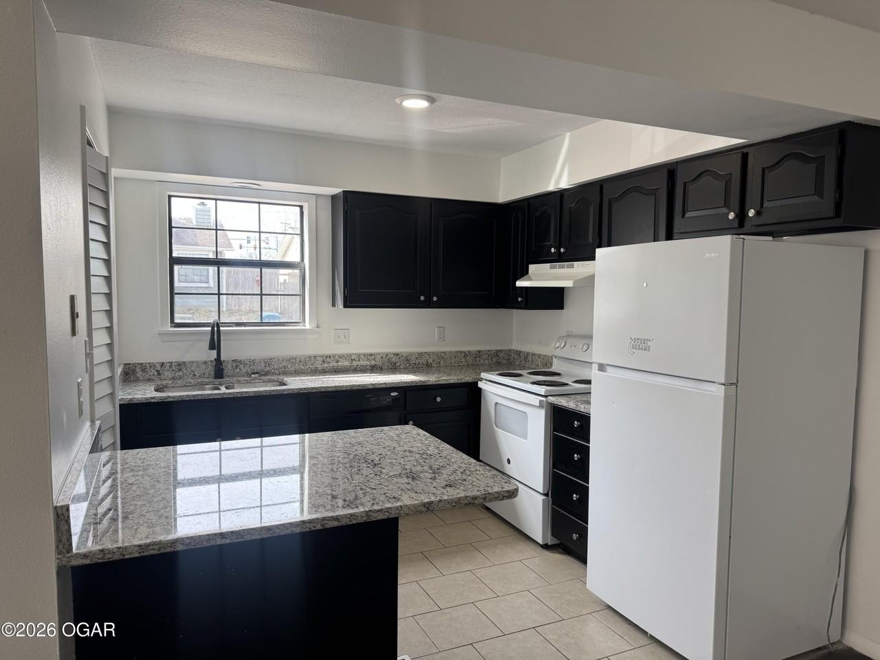 721 W 31st Ter - Photo 5 of 10