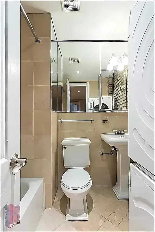 330 E 6th St #2F - Photo 3 of 5