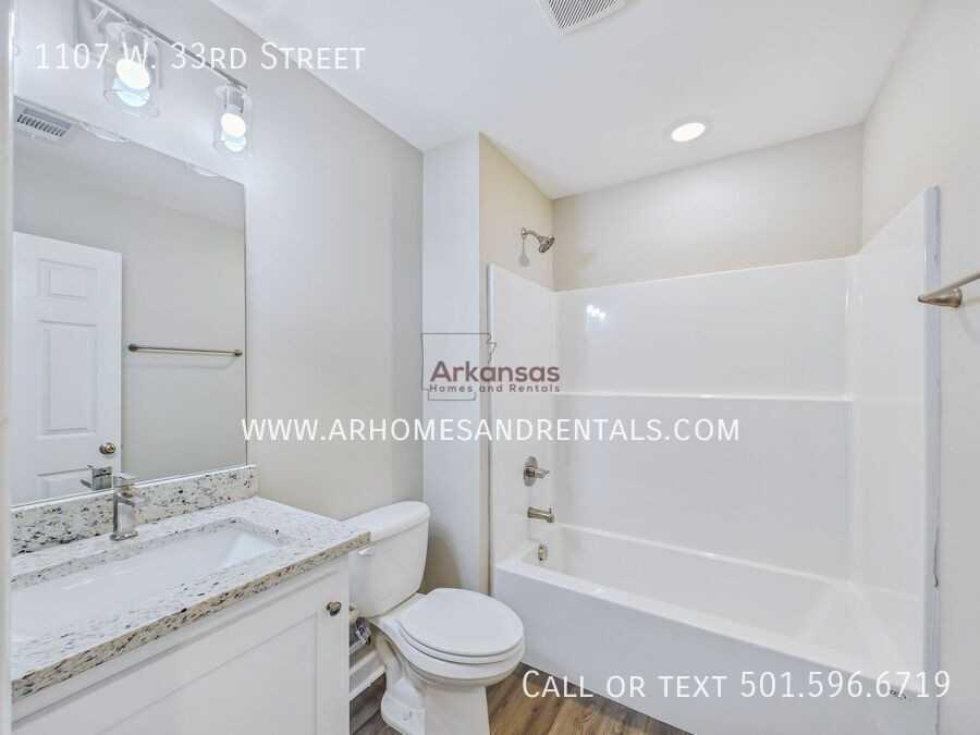 1107 W 33rd St - Photo 6 of 11