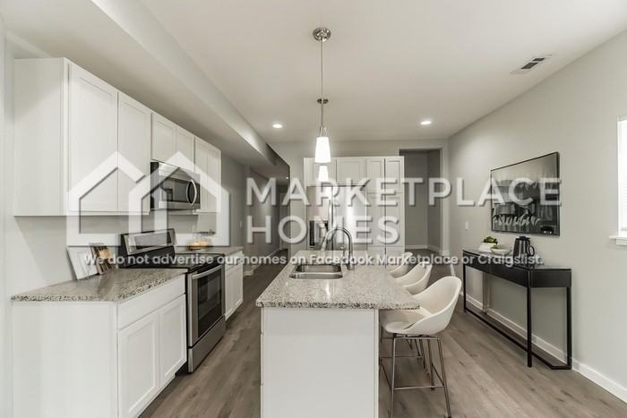 1013 Harlan St - Photo 5 of 23