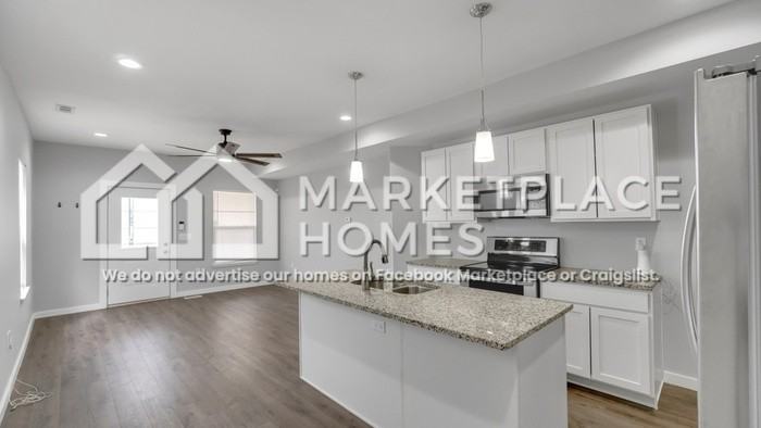 1013 Harlan St - Photo 7 of 23