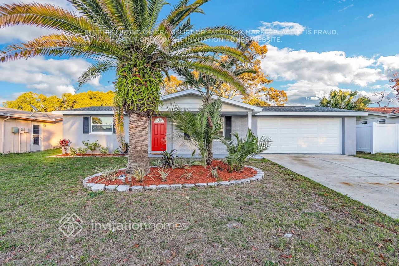 9900 Lakeside Ln - Photo 2 of 26