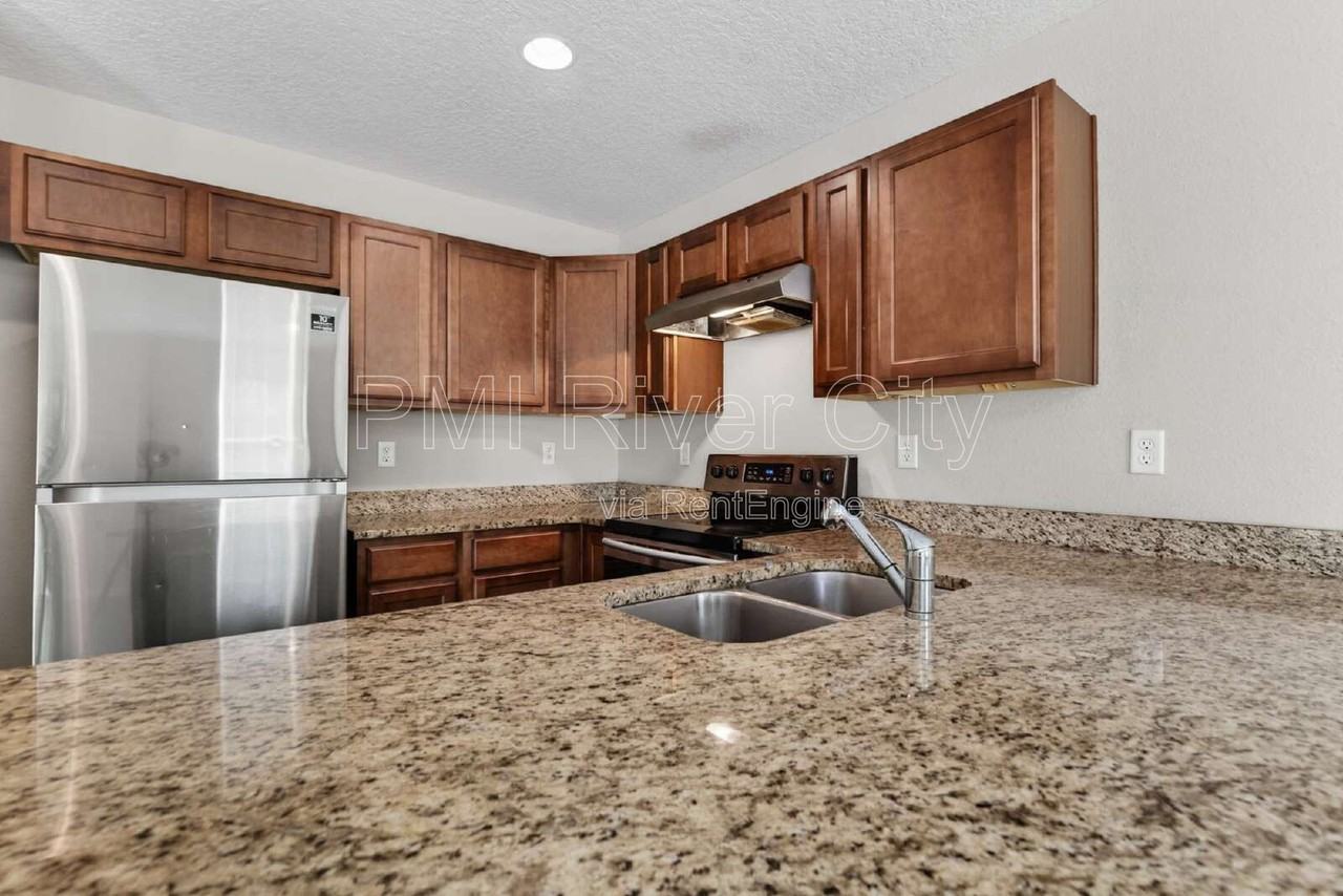 7608 Rain Forest Dr N - Photo 2 of 45