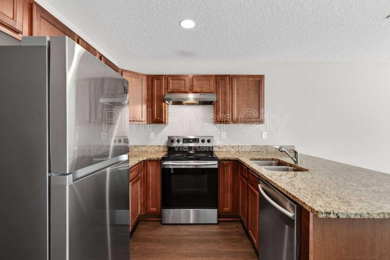 7608 Rain Forest Dr N - Photo 3 of 45