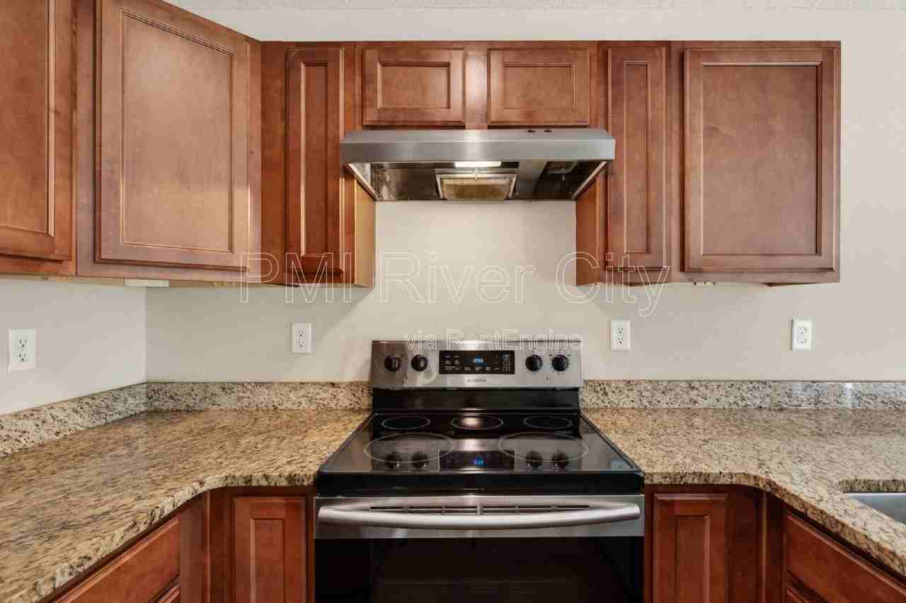 7608 Rain Forest Dr N - Photo 4 of 45