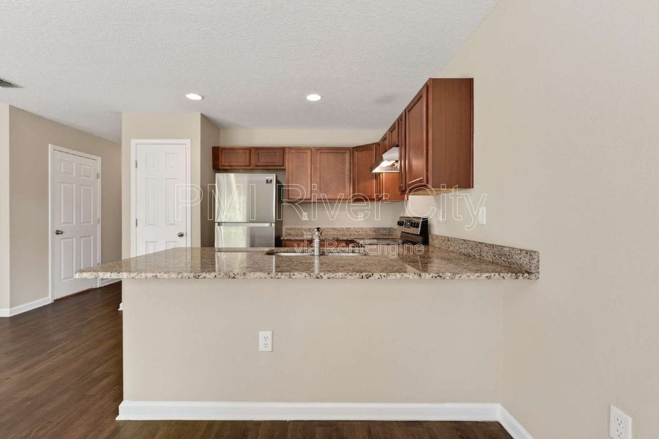 7608 Rain Forest Dr N - Photo 6 of 45