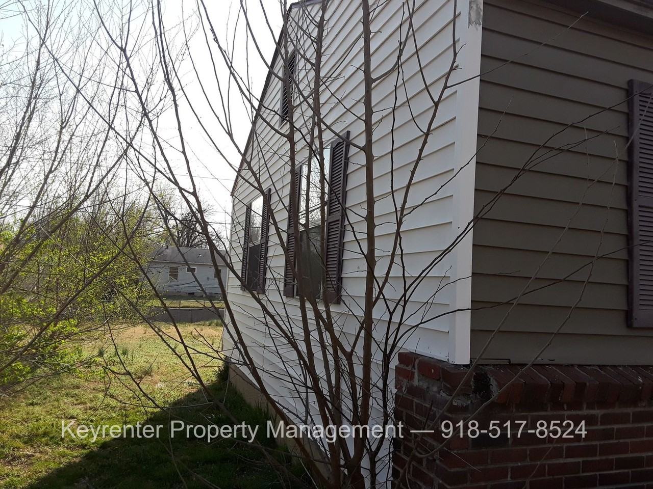 636 E 49th Pl N - Photo 2 of 17