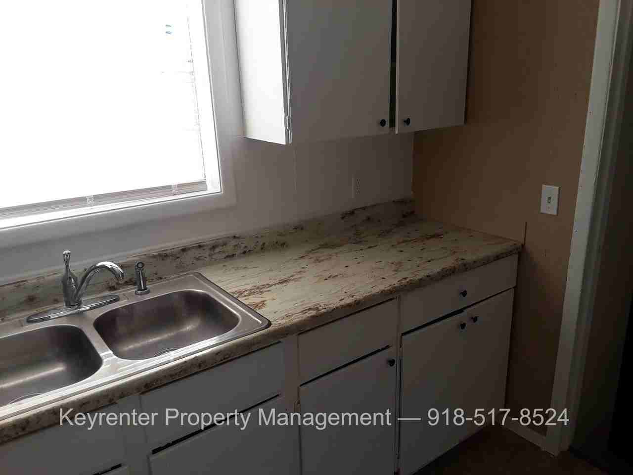 636 E 49th Pl N - Photo 5 of 17