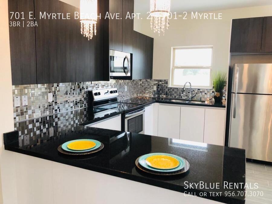 701 E Myrtle Beach Ave Apt 2 - Photo 3 of 18