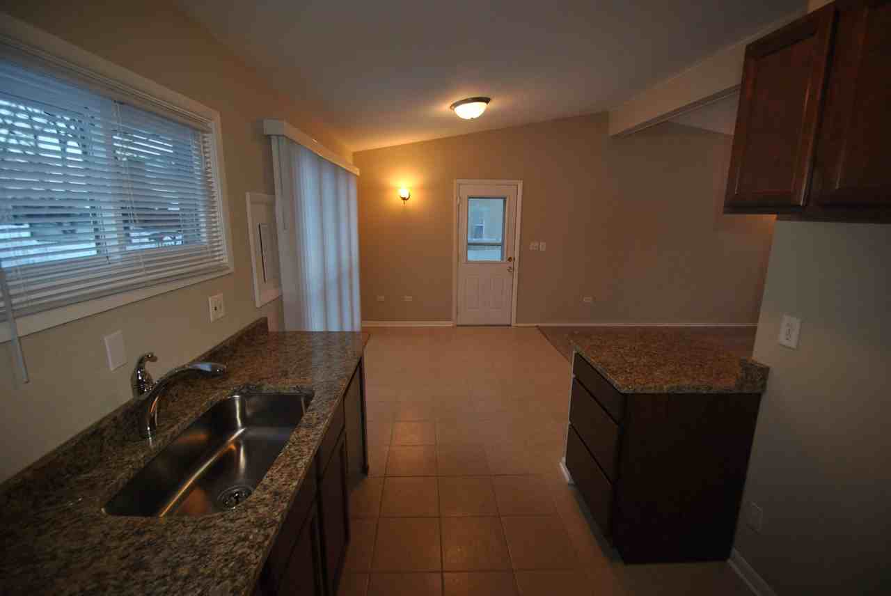 7329 Giddings Ave - Photo 3 of 7