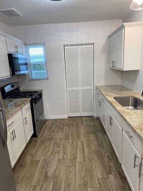 2537 E Clarendon Ave Apt 2 - Photo 3 of 12