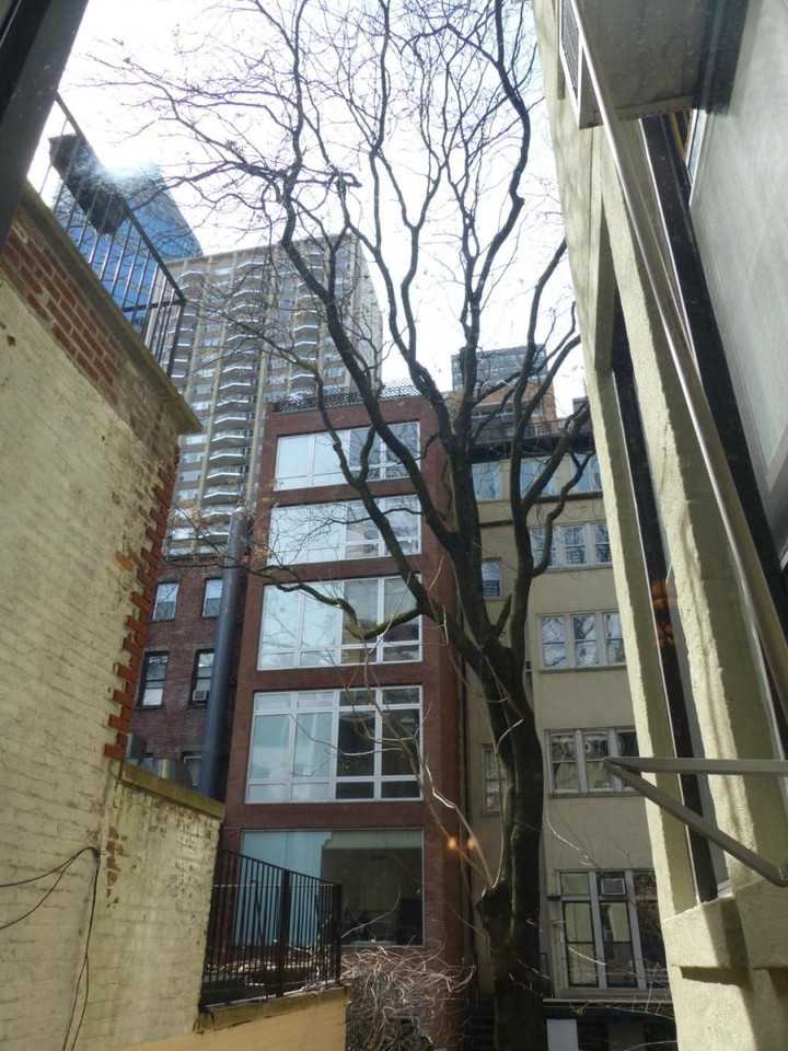 110 E 61st St - Photo 6 of 10