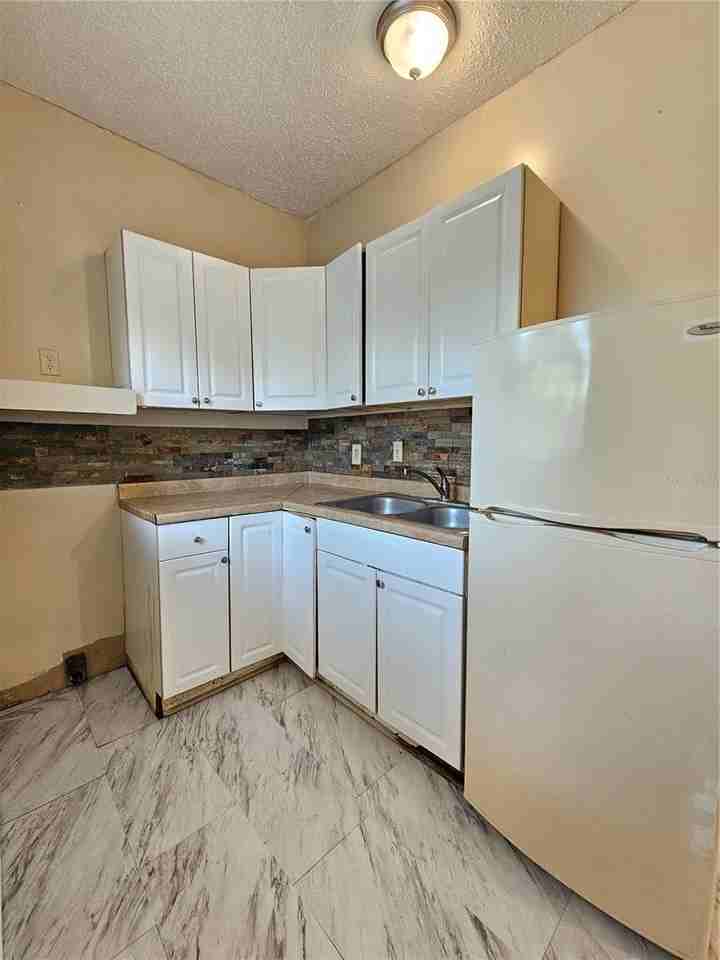 1504 E 99th Ave #C - Photo 4 of 9