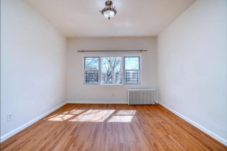 6039 Maspeth Ave - Photo 4 of 10