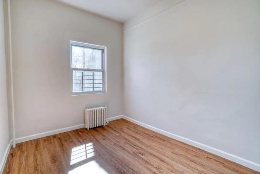 6039 Maspeth Ave - Photo 5 of 10
