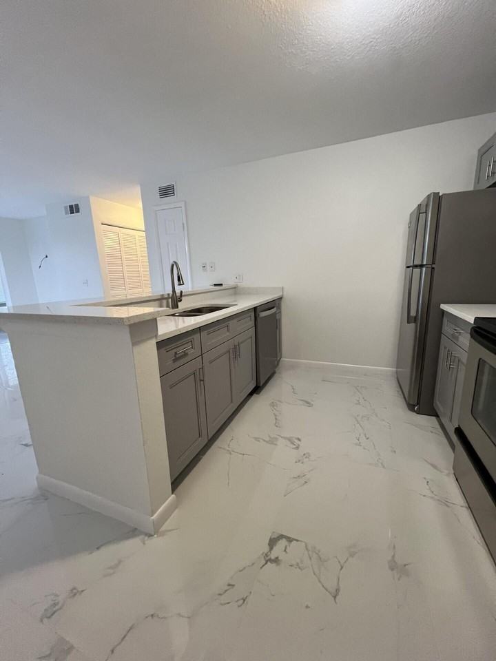 1845 Palm Cove Blvd #8-103 - Photo 3 of 25