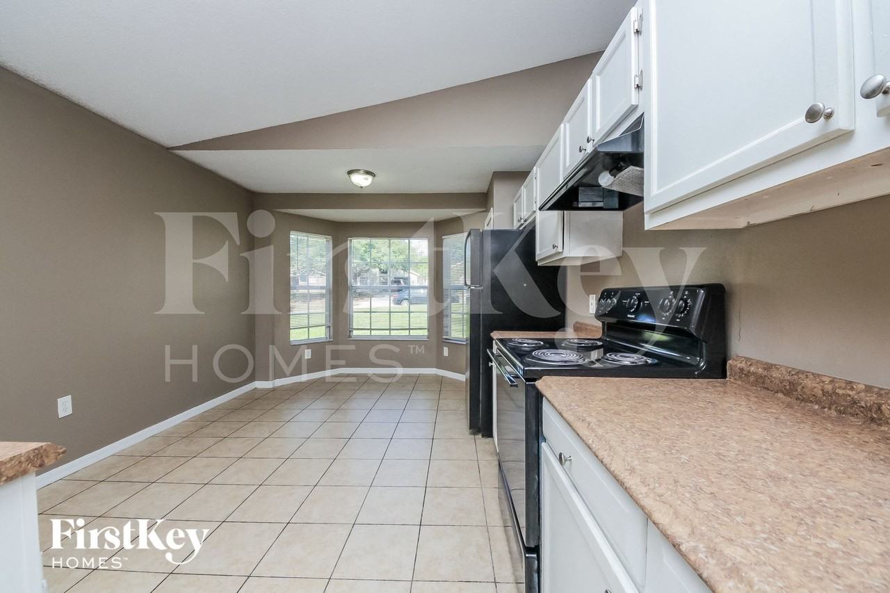 7560 Groveoak Dr - Photo 5 of 15