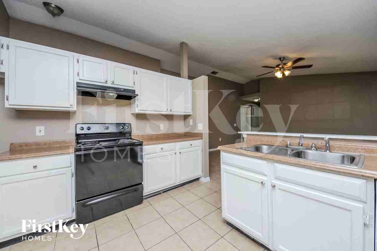 7560 Groveoak Dr - Photo 6 of 15