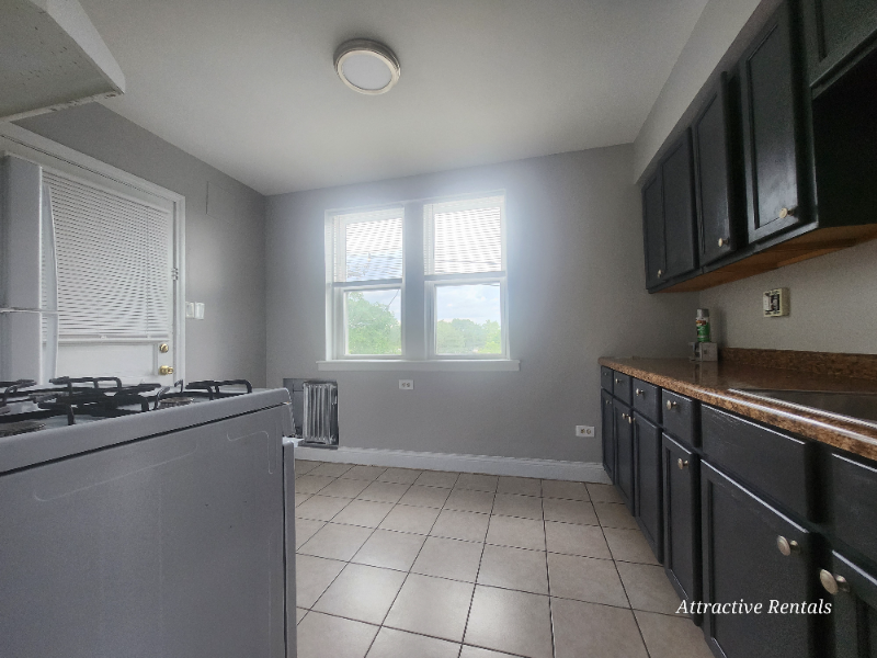 9909 S Charles St #1 - Photo 5 of 13