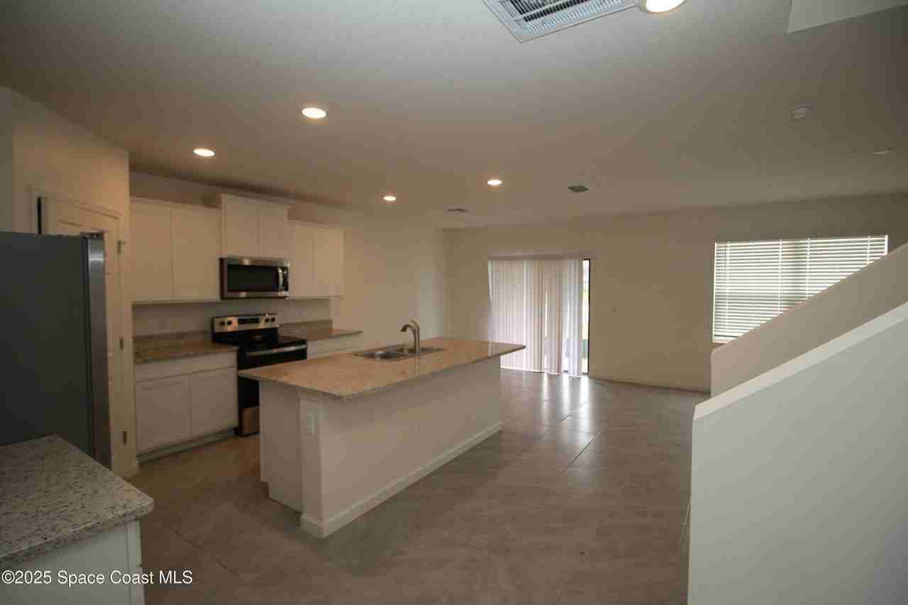 218 Bubbling Ln Nw - Photo 3 of 29