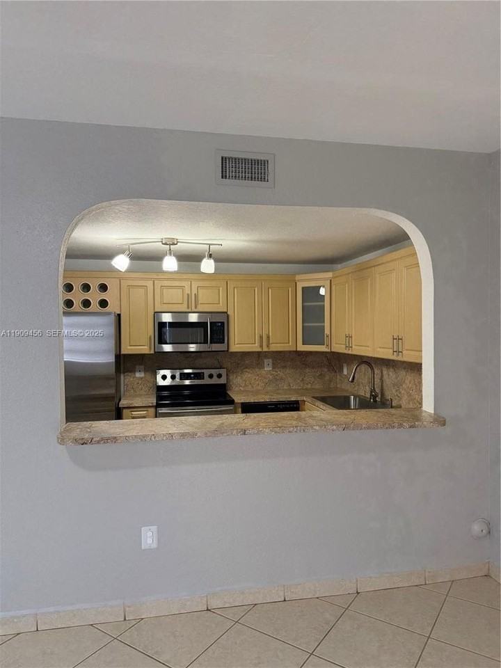 7542 Nw 175th St - Photo 3 of 15