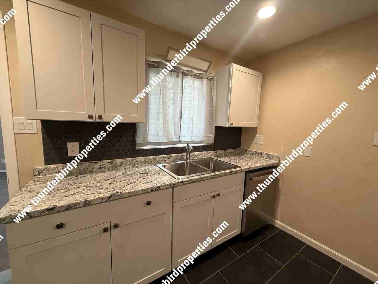 7408 Euclid Ave Ne - Photo 6 of 18