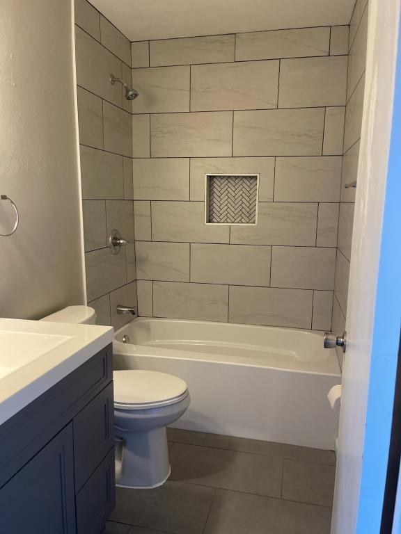 1409 Mcdonald Ave - Photo 4 of 16