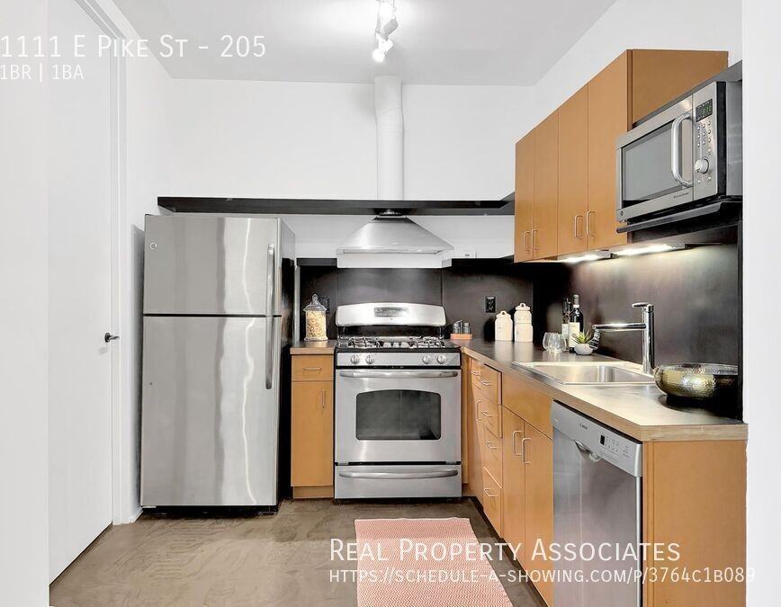 1111 E Pike St #205 - Photo 3 of 23