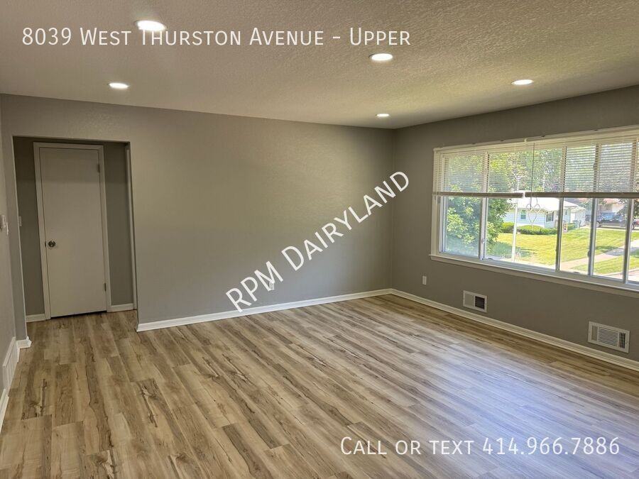 8039 W Thurston Ave - Photo 2 of 18