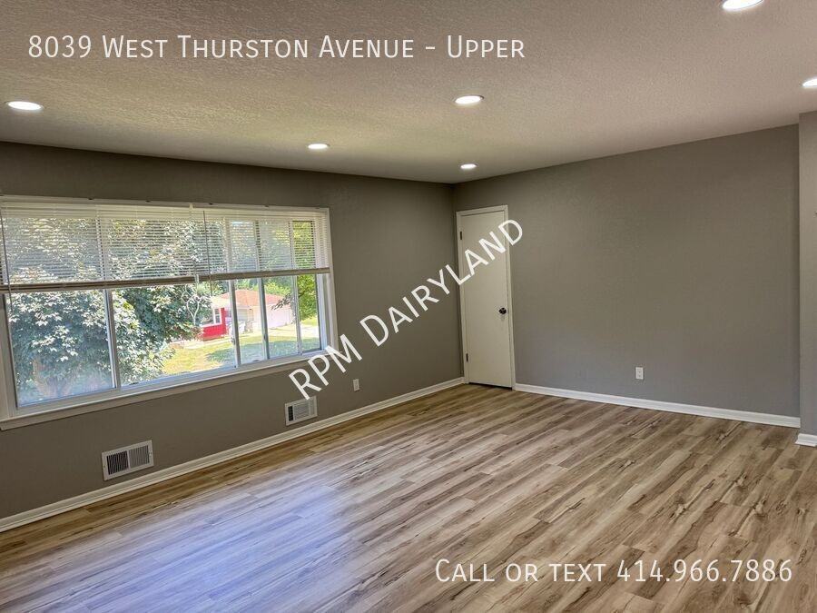 8039 W Thurston Ave - Photo 3 of 18