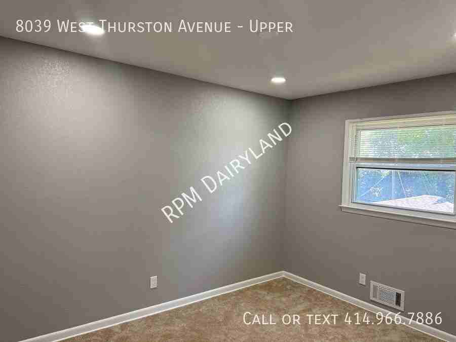 8039 W Thurston Ave - Photo 6 of 18