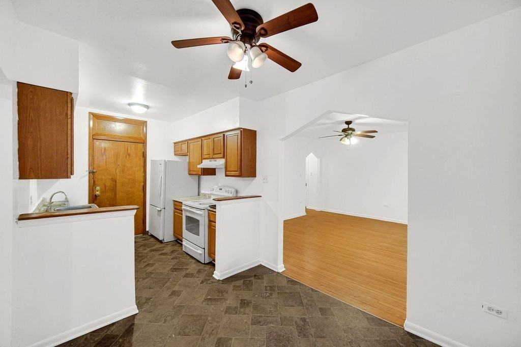 7011 South Merrill Avenue, Unit 7019 - Unit 106 - Photo 4 of 20