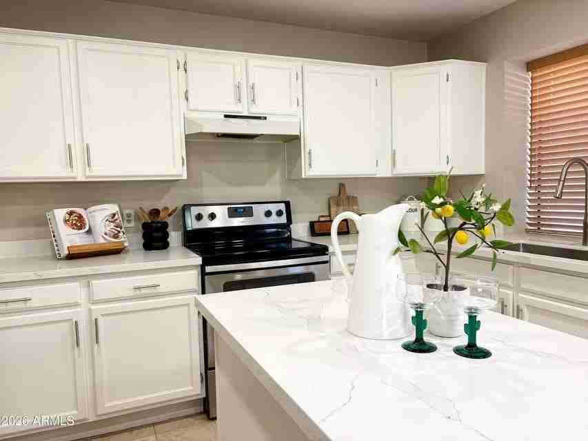 5946 E Kelton Ln - Photo 4 of 16