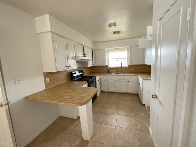 1066 Burkshire Dr - Photo 5 of 9