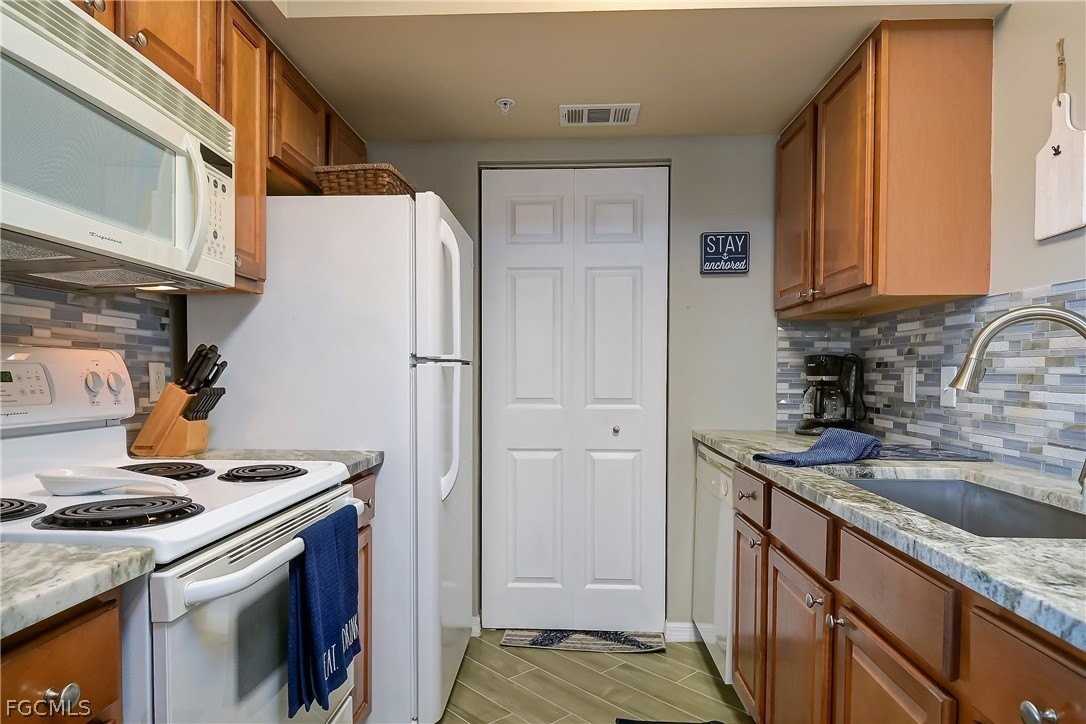 15655 Ocean Walk Cir #205 - Photo 5 of 31