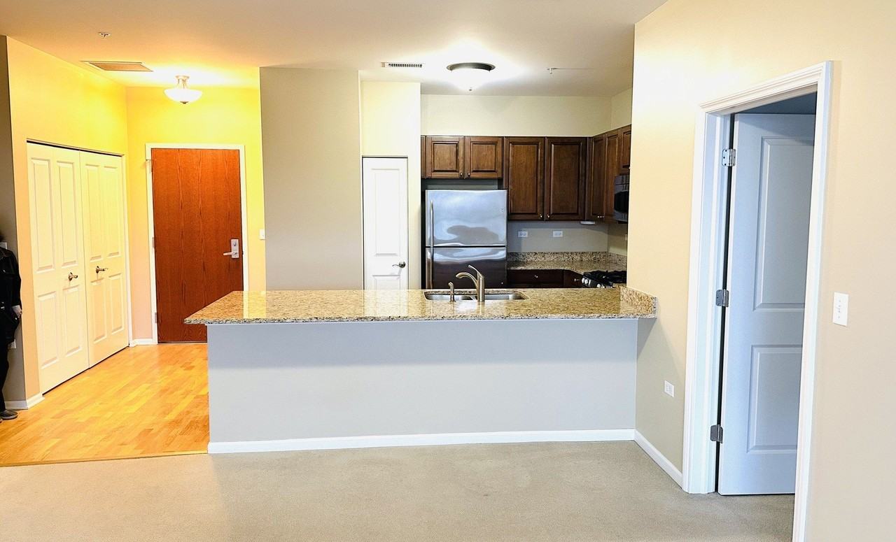 801 Village Center Dr Unit 204 - Photo 3 of 9