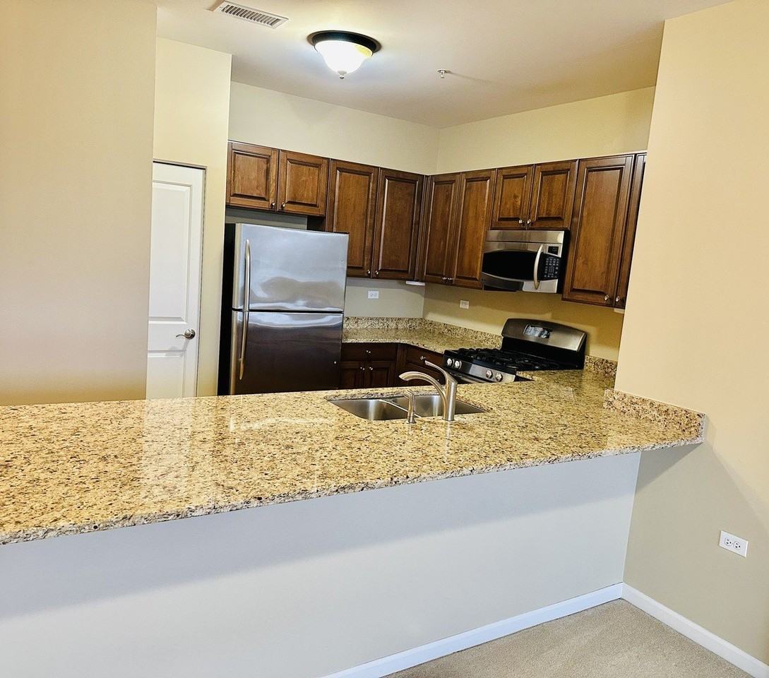 801 Village Center Dr Unit 204 - Photo 4 of 9