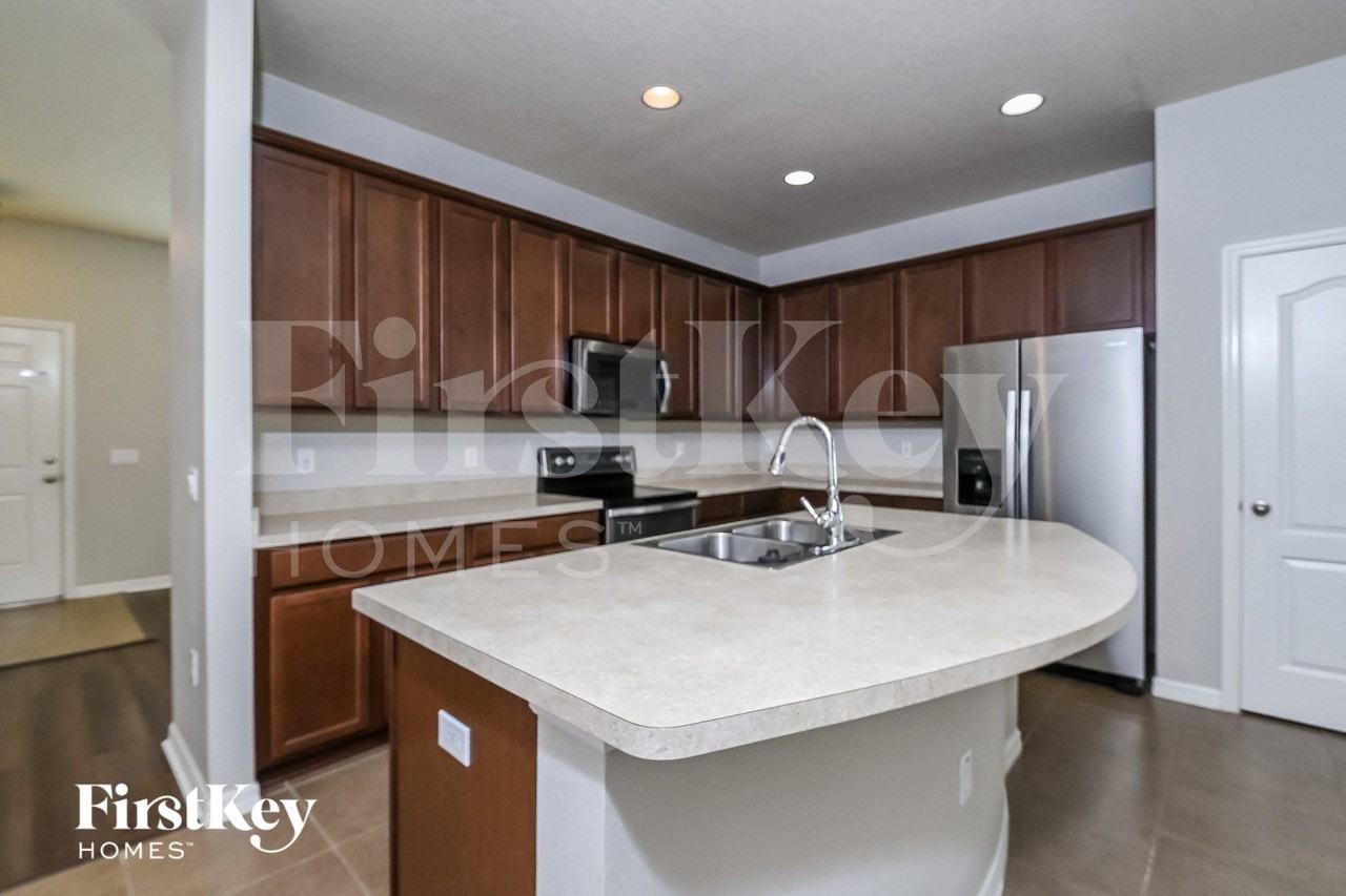 7724 Tangle Rush Dr - Photo 5 of 15